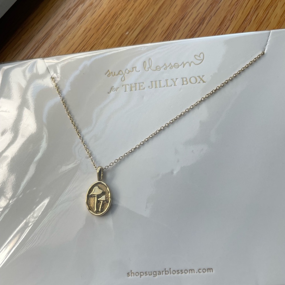 sugar blossom for the Jilly box. Mushroom necklace